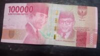Uang palsu